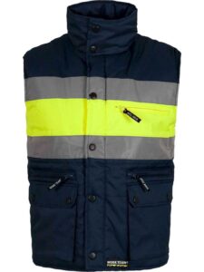 WorkTeam Chaleco acolchado y multibolsillos con dos cintas reflectantes y tejido de alta visibilidad. HOMBRE