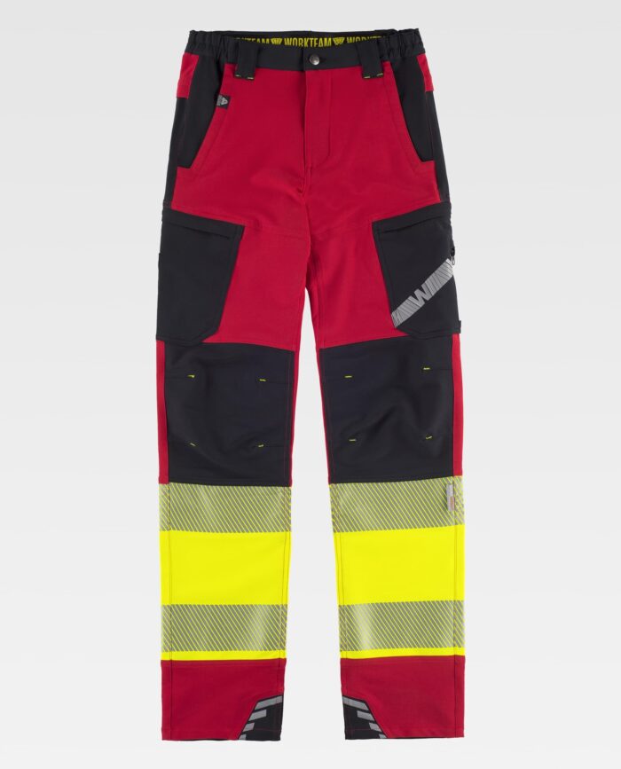 Pantalón elástico tricolor combinado con alta visibilidad y cintas reflectantes segmentadas. Dos bolsos de abertura inclinada en los costados, dos bolsos laterales de plastón con cierre de cremallera y bolsos superpuestos. Dos bolsos traseros interiores. Cortes decorativos con pinza en rodilla. Dos cintas reflectantes segmentadas termoadhesivas en perneras. Cinta decorativa personalizada en bolso de pernera. Elástico en los laterales de la cintura. Trabillas anchas. Detalles reflectantes.  Cierre de botón metálico y bragueta de cremallera. - Imagen 2
